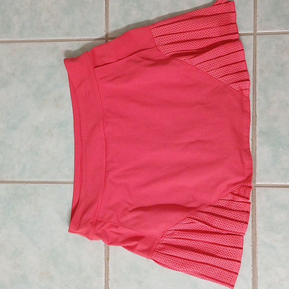 Under Armour orange tennis skirt size medium with shorts